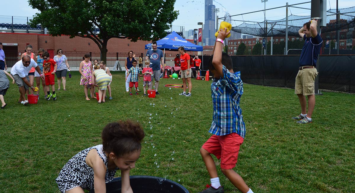 kids playing outside with water